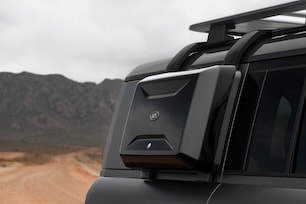 Land Rover Defender - Gloss Black Exterior Side-mounted Gear Carrier